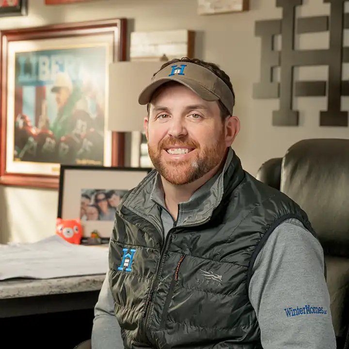 Environmental portrait of the founder of a home building company in Athens, AL.