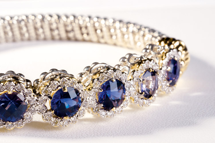 Jewelry photographer diamond, silver and gold bracelet.