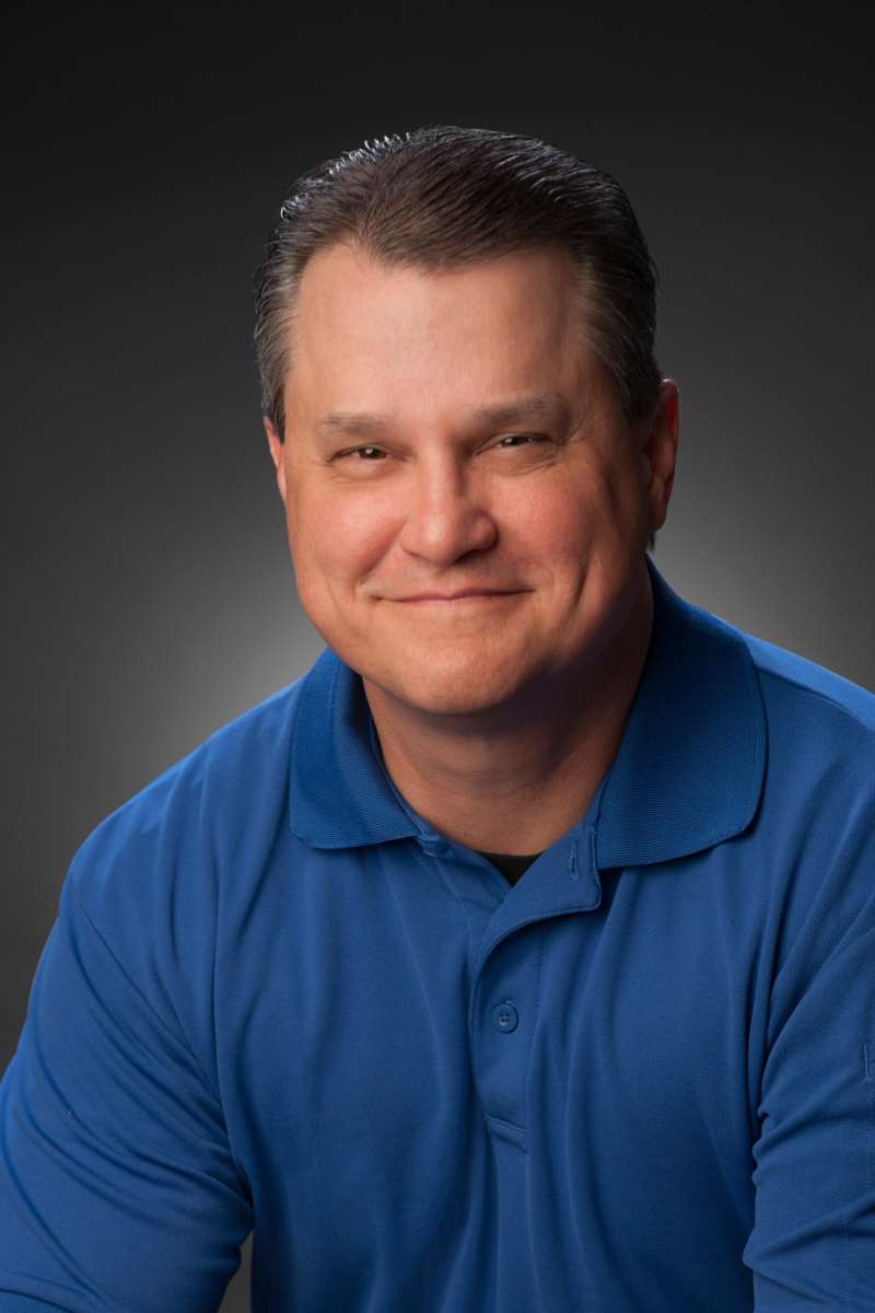Corporate headshot of a defense manufacturing executive in Madison, AL.